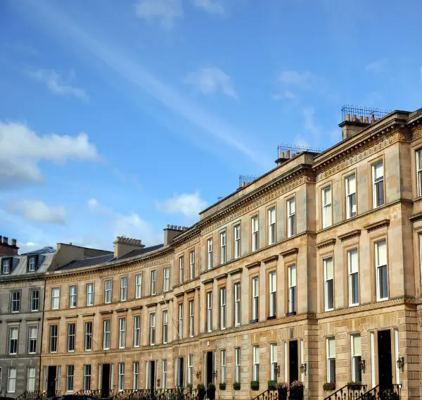 Traditional Scottish residential street with terraced houses, representing property transactions in Scotland
