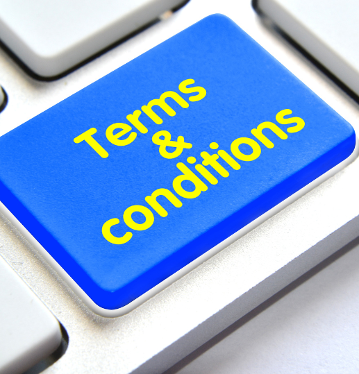 Keyboard with highlighted 'Terms & Conditions' button symbolising contract terms in business