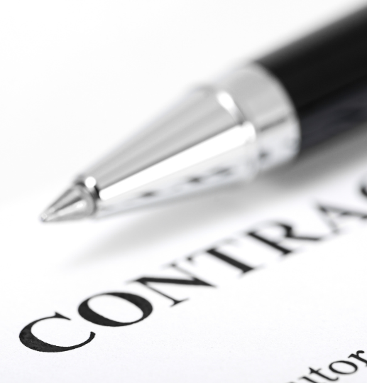 Top of a contract with a pen, representing legal contract review in Scotland