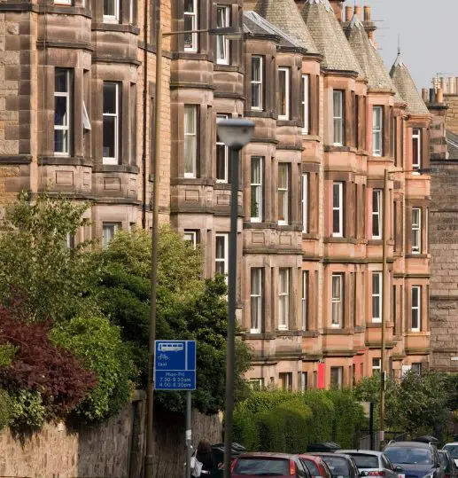 Traditional Scottish tenement block in a residential area, representing the private rented sector.