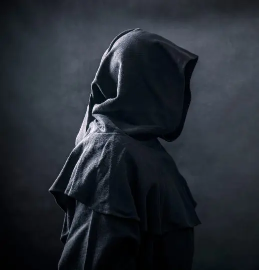 Person in a black cloak symbolising secrecy and strategic gifting for inheritance tax planning