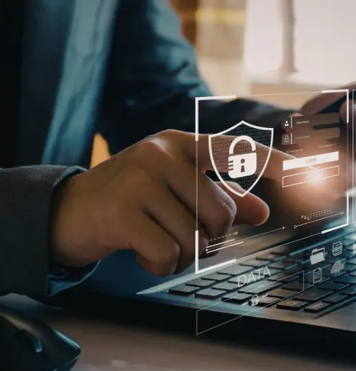Man typing on a laptop with padlock overlay representing AML and source of funds checks when buying a home in Scotland