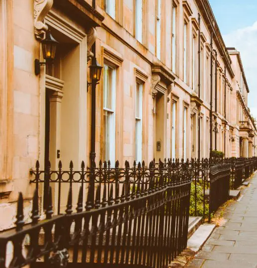 Traditional Scottish street with sandstone tenements, representing rental properties in Scotland