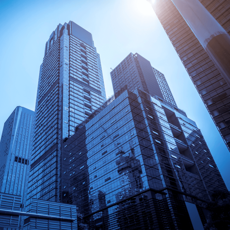 Modern glass skyscrapers representing commercial property conveyancing in Scotland