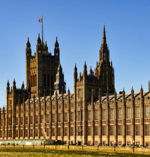 The UK Houses of Parliament in London, viewed from across the River Thames