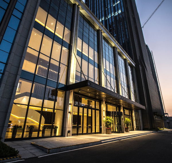 Modern commercial building viewed from ground level