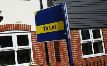 To Let sign outside a modern apartment building in Scotland, representing rental property and private landlord lettings