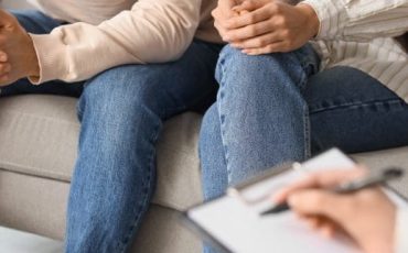 Couple attending a family mediation session in Scotland to resolve separation issues